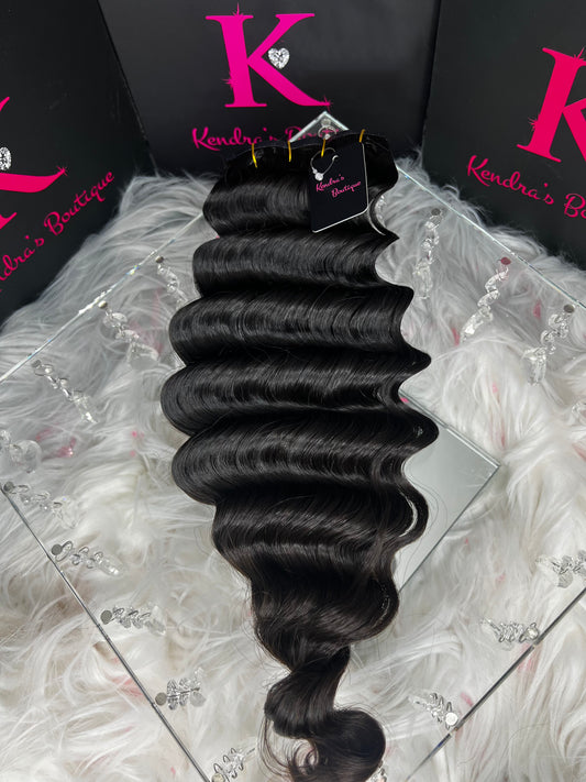 Raw Brazilian Loose Deep Wave Seamless Clip-In Extensions